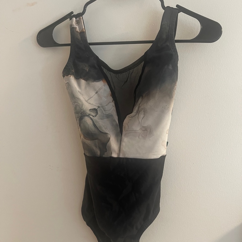 Lucky Leo black, marble, and mesh leotard